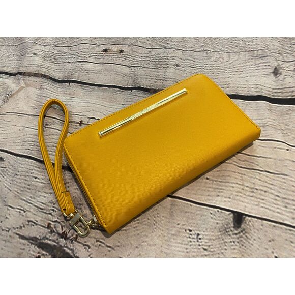 Steve Madden Handbags - Steve Madden Wristlet/Wallet Like New Mustard Colored Zipper Close